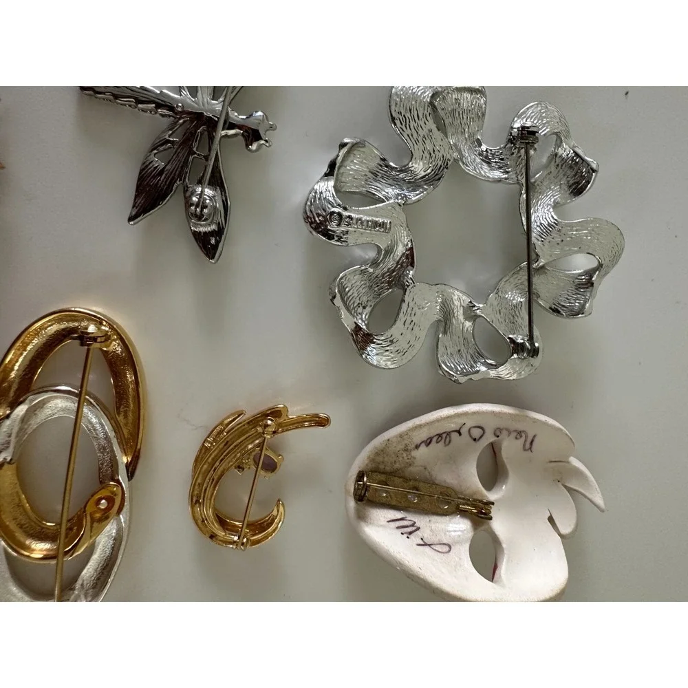 The Unbranded Brand brooch painted